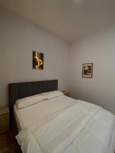 Ένα ή περισσότερα κρεβάτια σε δωμάτιο στο Fabian Apartment