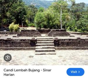 an image of an amphitheater with stairs and trees at Mastermind Malay Semeling Homestay in Bedung