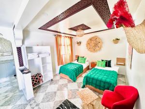 Ένα ή περισσότερα κρεβάτια σε δωμάτιο στο Studio de vacances