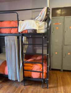 a bunk bed room with two bunk beds at Tlv HOSTEL in Cusco