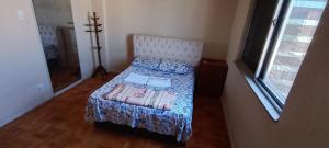 Ένα ή περισσότερα κρεβάτια σε δωμάτιο στο Magnífico Loft com quarto casal no centro de Niterói