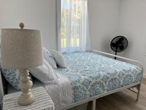 Voodi või voodid majutusasutuse Barefoot Bungalow toas