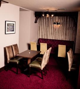 Uma área de estar em Darnley Lodge Hotel