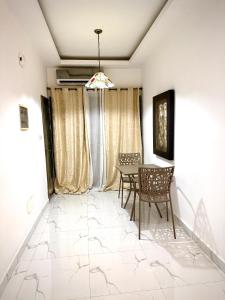 Χώρος καθιστικού στο APPARTEMENT MODERNE AVEC PISCINE-ASCENSEUR DEUX PLATEAU,abidjan