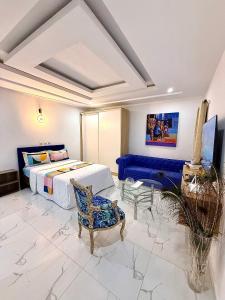 Ένα ή περισσότερα κρεβάτια σε δωμάτιο στο APPARTEMENT MODERNE AVEC PISCINE-ASCENSEUR DEUX PLATEAU,abidjan