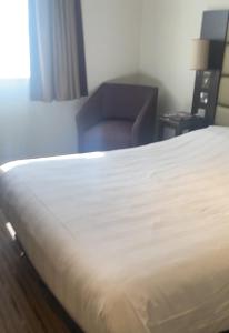 Ένα ή περισσότερα κρεβάτια σε δωμάτιο στο The Chetwode Arms