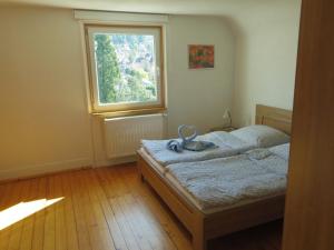 Postel nebo postele na pokoji v ubytování Villa Fink