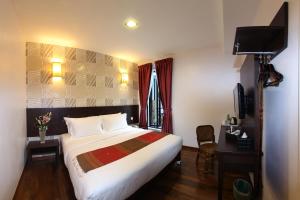 TV a/nebo společenská místnost v ubytování Hotel Richbaliz Selayang