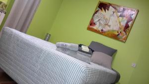 Postel nebo postele na pokoji v ubytování Om'Sleeping B&B