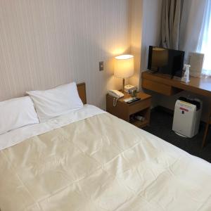 Postel nebo postele na pokoji v ubytování Hotel Togane Hills