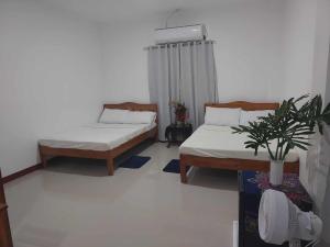 Ένα ή περισσότερα κρεβάτια σε δωμάτιο στο Melby's Home