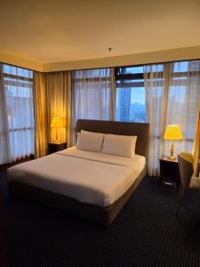 Postel nebo postele na pokoji v ubytování Diamond Apartment Suite At Times Square + 95 fotografií