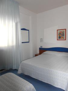 Katil atau katil-katil dalam bilik di Albergo Godenizzo
