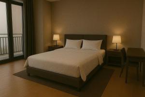 Ένα ή περισσότερα κρεβάτια σε δωμάτιο στο Pintukan Dorane