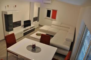 TV a/nebo společenská místnost v ubytování Stars Palace - apartments and rooms