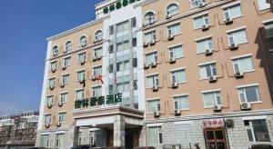 a large tall building with windows on the side of it at GreenTree Inn Beijing Daxing Xingye Street Liyuan Business Hotel in Beijing