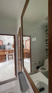 a bathroom with a sink and a mirror at Hin Kong Hide Away 1 in Wok Tum