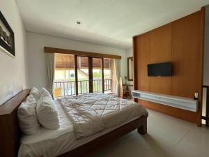 Ένα ή περισσότερα κρεβάτια σε δωμάτιο στο Balcony Living Apartment