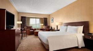 Una cama o camas en una habitación de Par-A-Dice Hotel Casino 59 fotos más