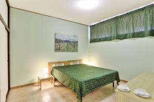 Postel nebo postele na pokoji v ubytování Residence Habitat