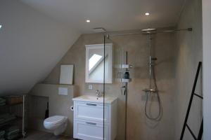 a bathroom with a shower and a sink and a toilet at Green Bliss in Wervik +39 photos