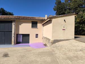 a house with a heart painted on the side of it at Chambre Romantique avec Spa Privé Intérieur in Rimons +5 photos