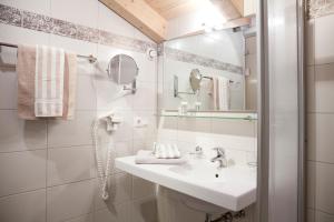 Vannituba majutusasutuses Hotel Troschana