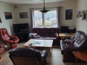 Χώρος καθιστικού στο 8 person holiday home in Mølnarodden