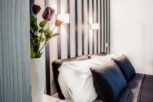 Postel nebo postele na pokoji v ubytování Venere Rooms