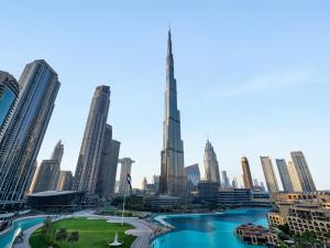 a view of a city with skyscrapers at Panoramic Burj 5br Condo with Full Led & Fountain View in Dubai +32 photos