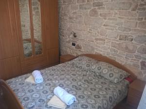 Postel nebo postele na pokoji v ubytování Barbiere Guest House