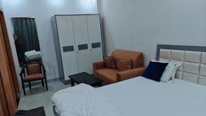 Ένα ή περισσότερα κρεβάτια σε δωμάτιο στο Arya Luxury +2 φωτογραφίες
