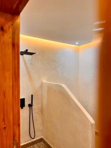 a shower in a bathroom with a shower at Soho Heaven - Cloud & Relaxation Atmosphere 2 Bedrooms in Essaouira