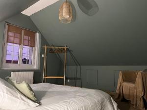 Ένα ή περισσότερα κρεβάτια σε δωμάτιο στο Airelles Spa - Jacuzzi - Sauna - Gîte de charme +9 φωτογραφίες