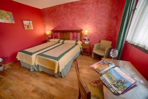 Postel nebo postele na pokoji v ubytování Hotel Duques de Najera