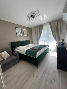 Postel nebo postele na pokoji v ubytování Alfa Apartment Free Parking Air Condition