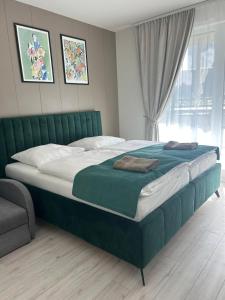 Postel nebo postele na pokoji v ubytování Alfa Apartment Free Parking Air Condition