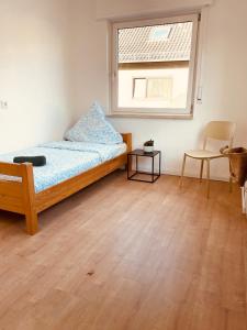 Un pat sau paturi într-o cameră la Odw homes - Large apartment with four bedrooms