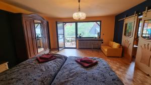 a bedroom with a bed with two pillows on it at Casa Moselle-Royal Stilvoll Urlauben an der Mosel in Reil