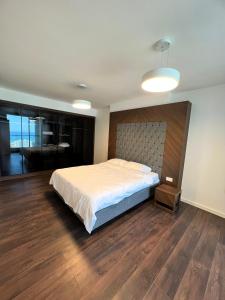 Postel nebo postele na pokoji v ubytování Grand Sapphire Luxury Residence 18