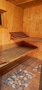 Фотография из галереи Domek Mazurski całoroczny nad jeziorem z sauną в городе Пасым