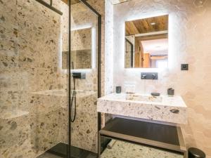 a bathroom with a sink and a shower at Appartement neuf 3 chambres proche des pistes, parking et Wi-Fi - FR-1-565-108 in Les Allues +10 photos