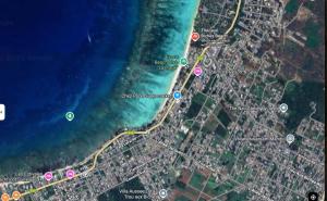 a map of a road next to the water at Epic Lodge in Trou aux Biches