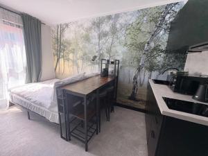 Ένα ή περισσότερα κρεβάτια σε δωμάτιο στο Praga Studio Apartments