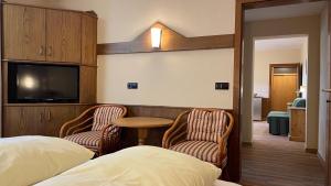 TV a/nebo společenská místnost v ubytování Haus Zellerwirt