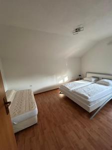 Postel nebo postele na pokoji v ubytování Villa Miševići