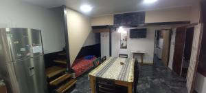 TV a/nebo společenská místnost v ubytování Loft super equipado con pileta climatizada