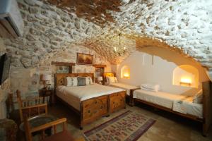 Ένα ή περισσότερα κρεβάτια σε δωμάτιο στο BABIL ANTIQUE HOTEL +128 φωτογραφίες