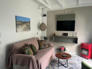 TV a/nebo společenská místnost v ubytování carol close1 small apartment