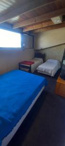 Postel nebo postele na pokoji v ubytování Loft super equipado con pileta climatizada + 12 fotografií
